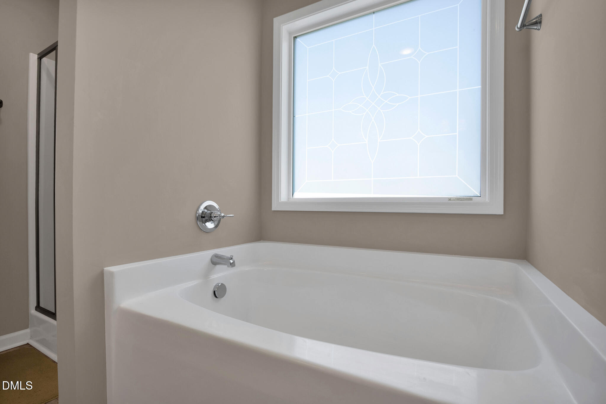 87 Hawks Croft Court Erwin, NC 28339 - Photo 19 of 30 a white bath tub sitting next to a window