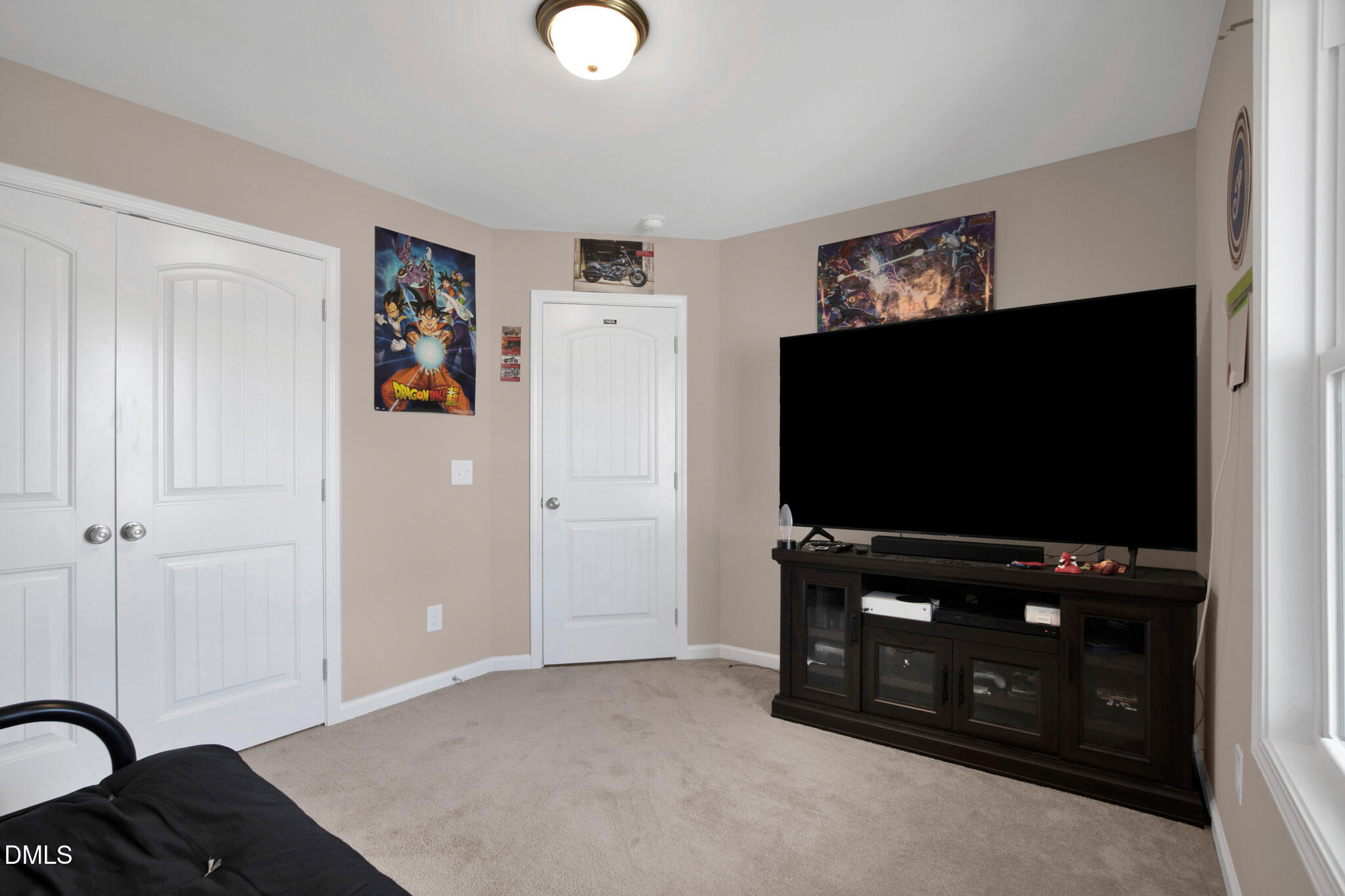 87 Hawks Croft Court Erwin, NC 28339 - Photo 21 of 30 a living room with furniture and a flat screen tv