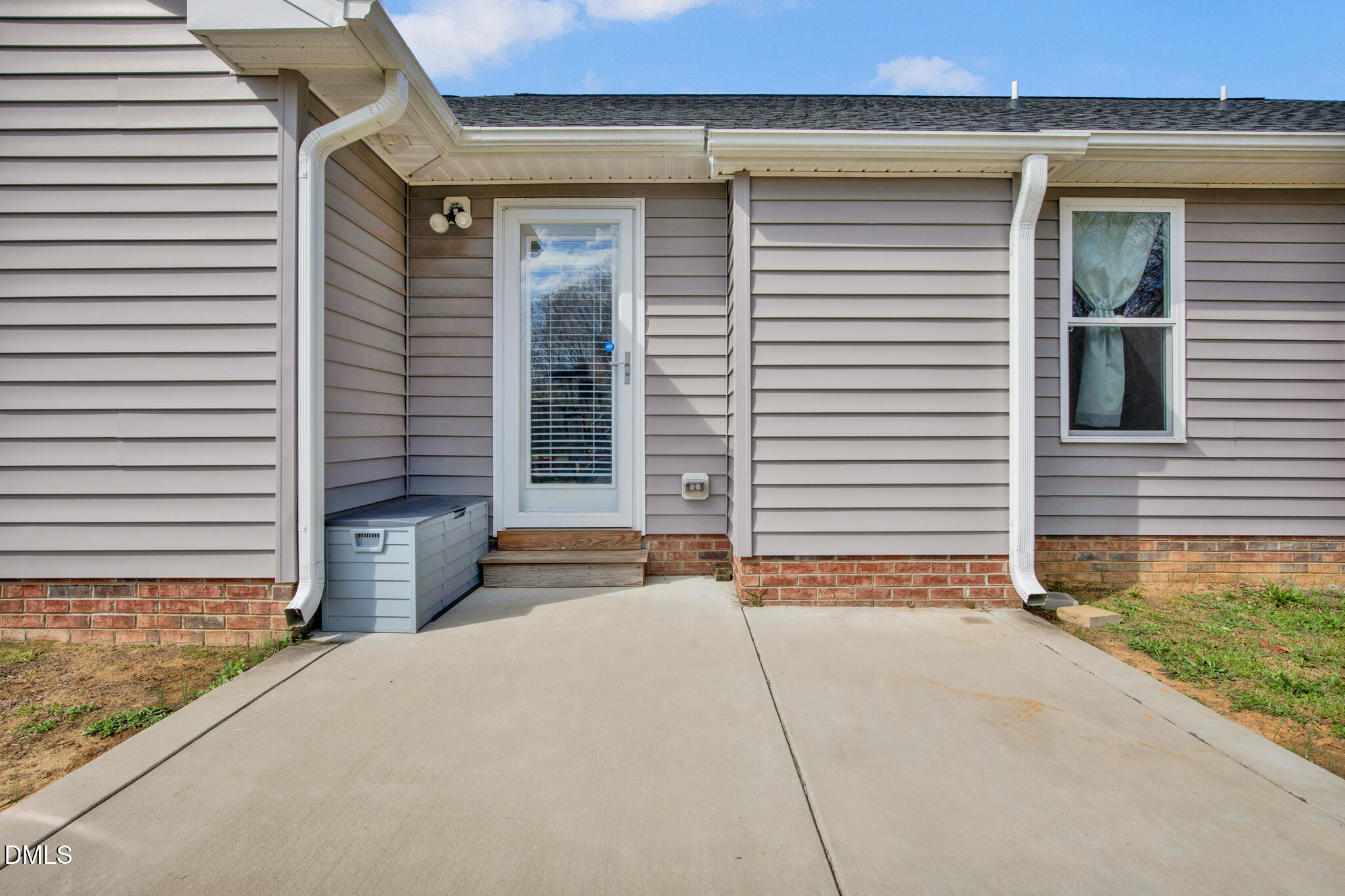 87 Hawks Croft Court Erwin, NC 28339 - Photo 26 of 30 a backyard of a house with yard and garage