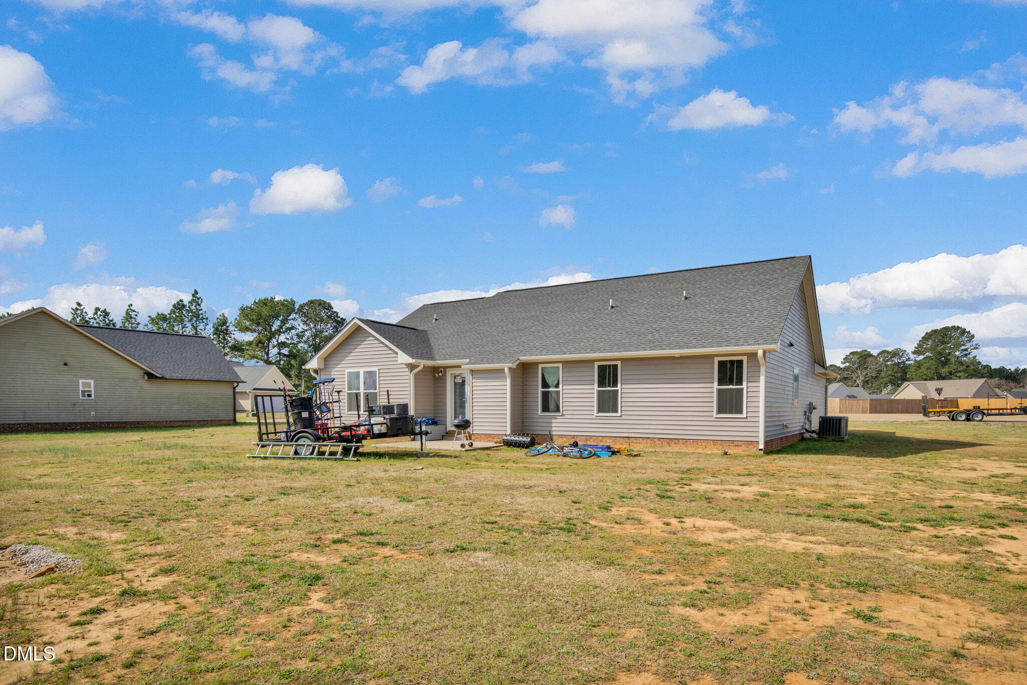 87 Hawks Croft Court Erwin, NC 28339 - Photo 27 of 30 a view of a house with a yard