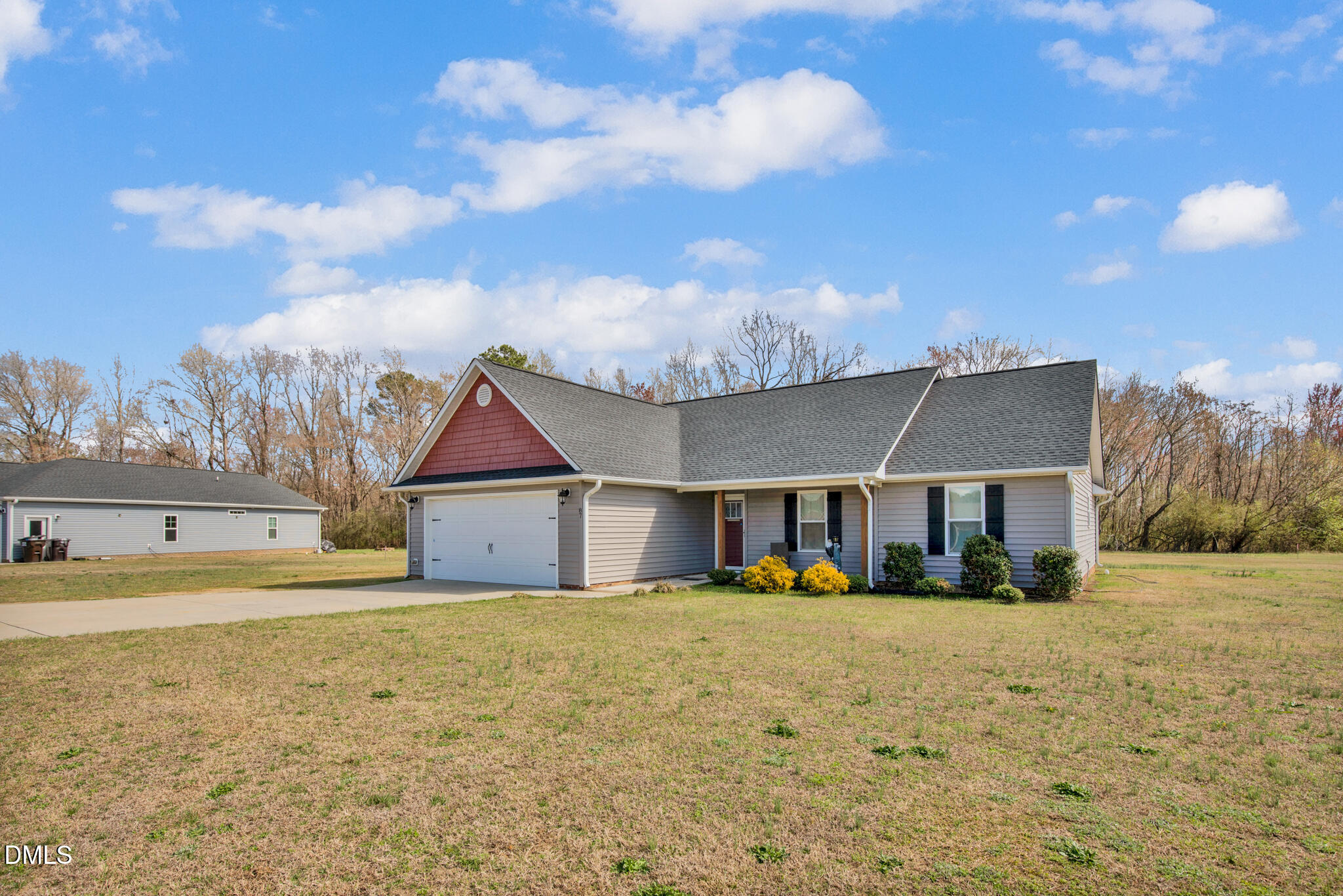 87 Hawks Croft Court Erwin, NC 28339 - Photo 3 of 30 a view of large house with a big yard