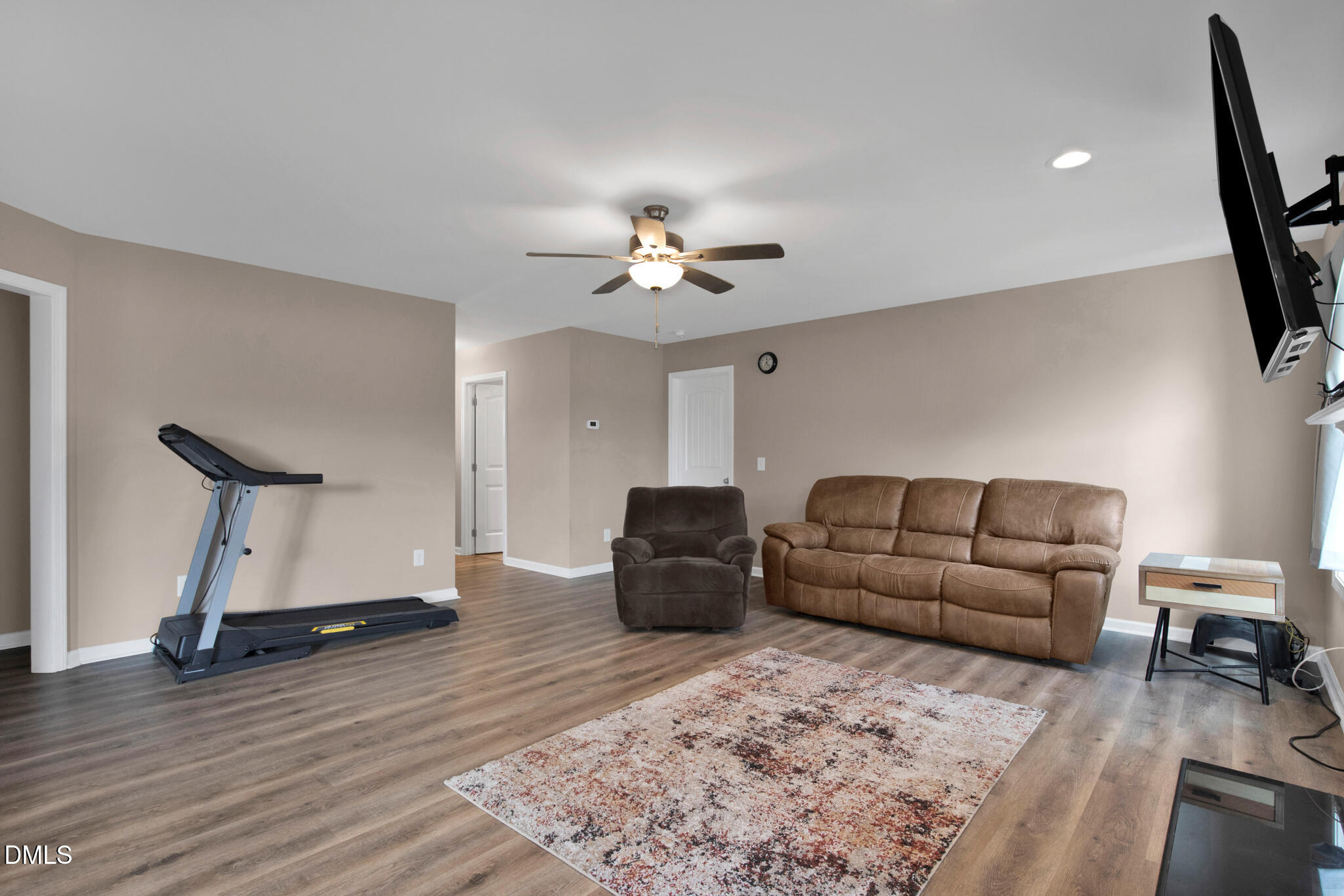 87 Hawks Croft Court Erwin, NC 28339 - Photo 6 of 30 a living room with furniture and a wooden floor
