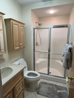 72 Pinnacle Road Ellington, CT 06029 - Photo 14 of 38 a bathroom with a toilet sink and shower
