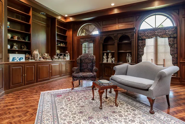 a kitchen with kitchen island a sink appliances and cabinets