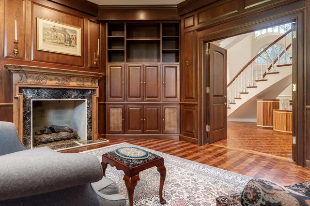 a kitchen with kitchen island granite countertop a sink and a stove