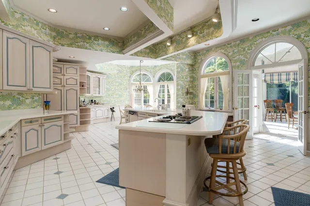 a view of a livingroom with an empty space and a fireplace
