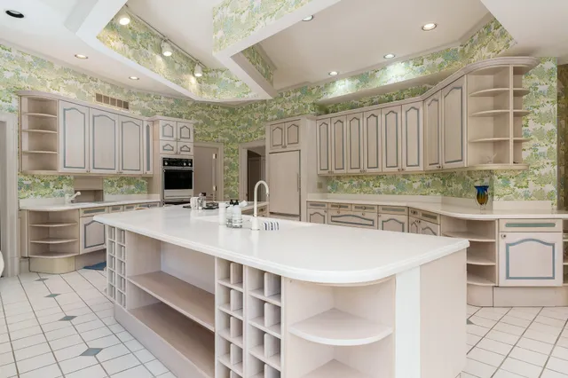 a white bath tub sitting in a bathroom