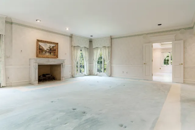 a view of a field with an trees