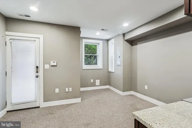 wooden floor and window in a room