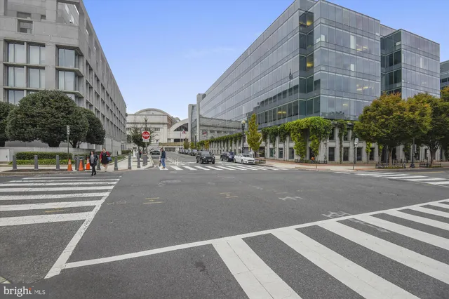 a city street lined with tall buildings