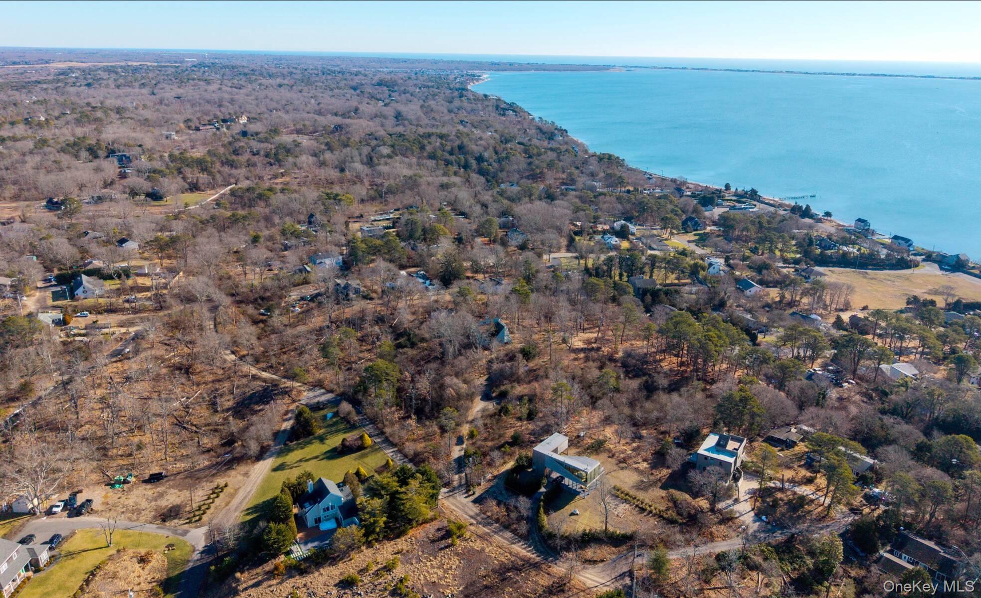 32 Old Canoe Place Road Hampton Bays, NY 11946 - Photo 12 of 12 an aerial view of beach and ocean