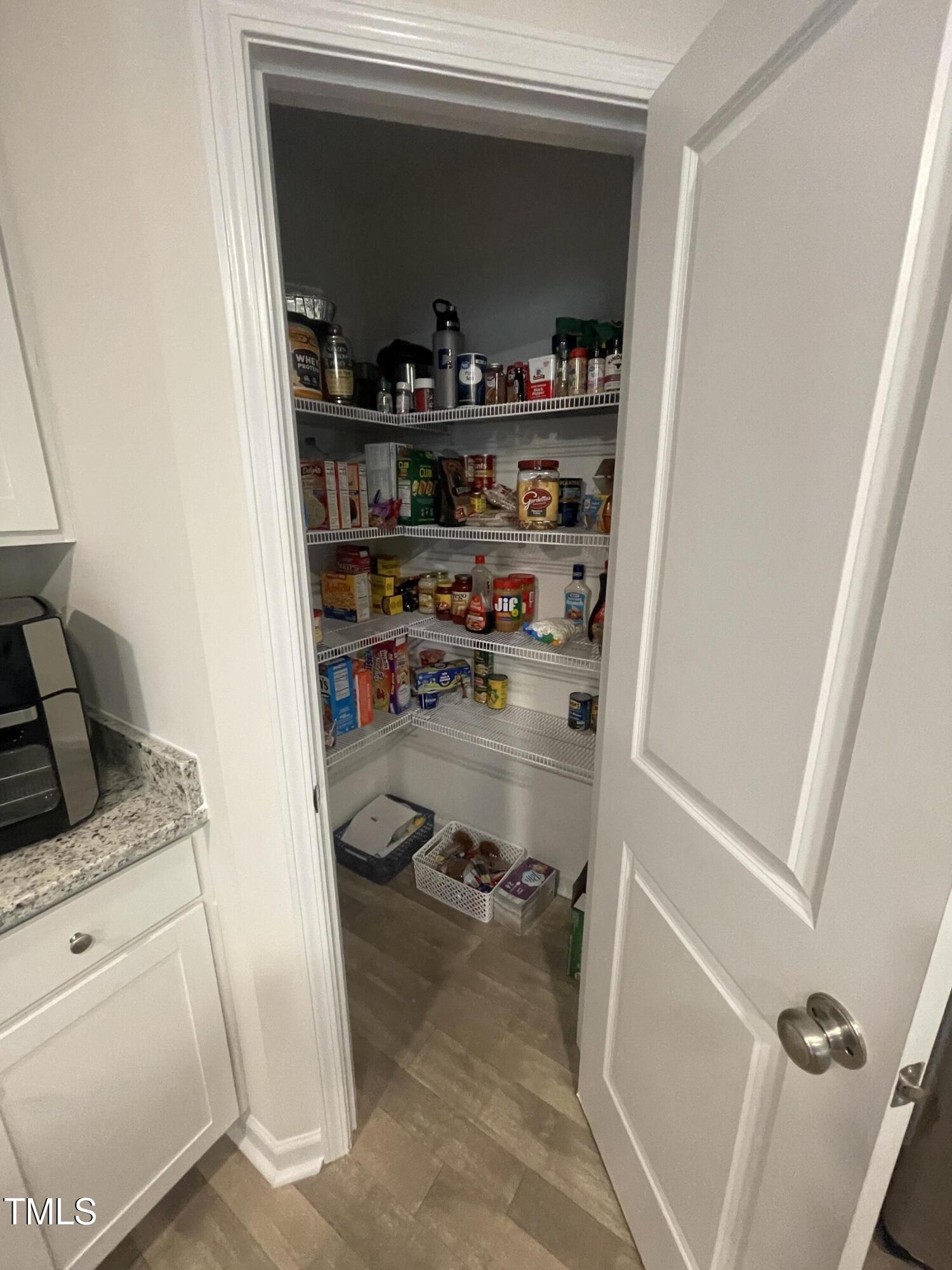 195 Presley Street Raeford, NC 28376 - Photo 13 of 37 a room with storage and utility