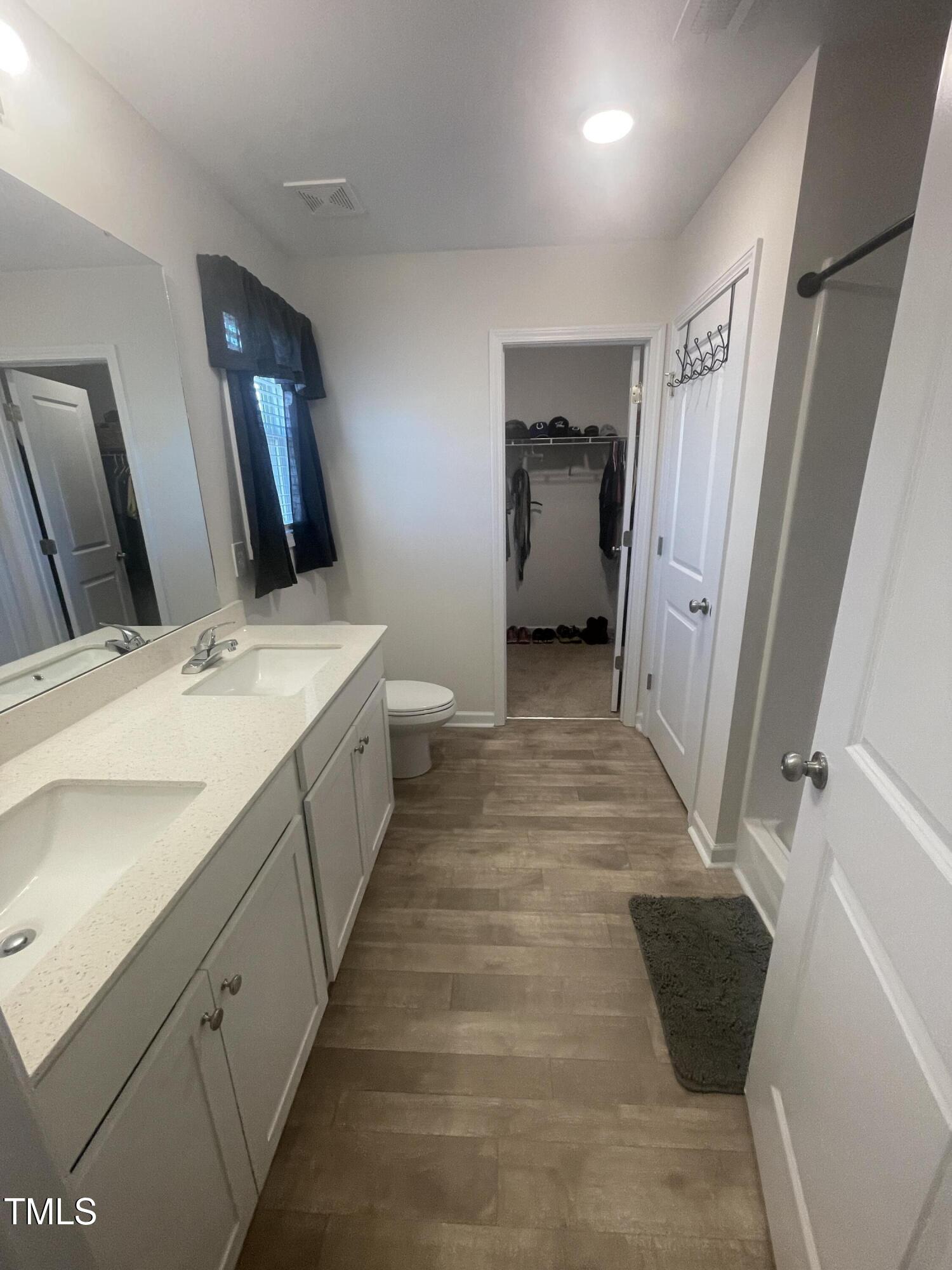 195 Presley Street Raeford, NC 28376 - Photo 22 of 37 a bathroom with sink and mirror