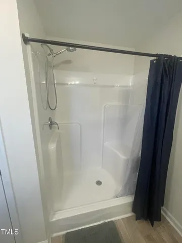 a bathroom with a sink a toilet a mirror and vanity