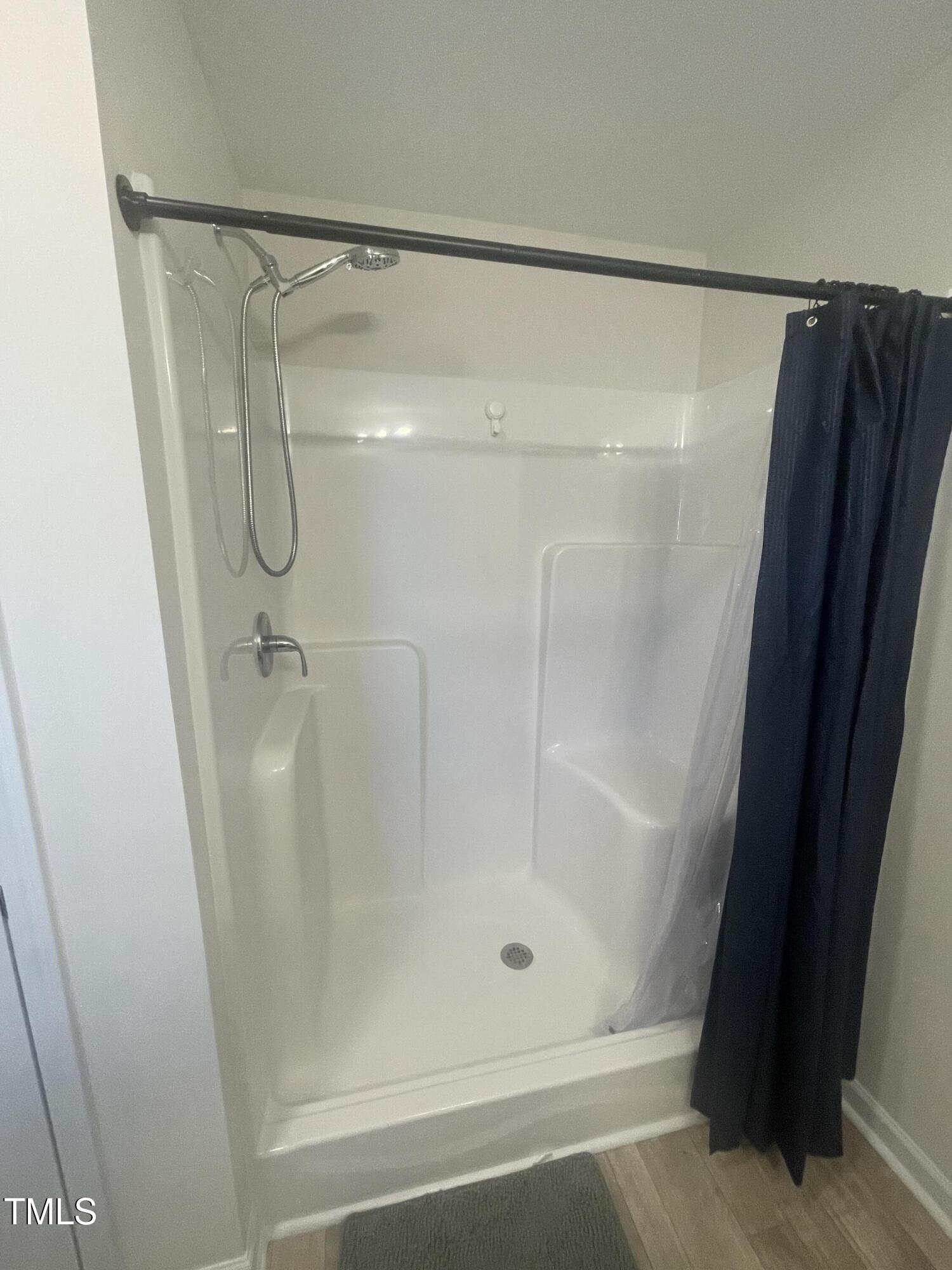 195 Presley Street Raeford, NC 28376 - Photo 23 of 37 a bathroom with a shower