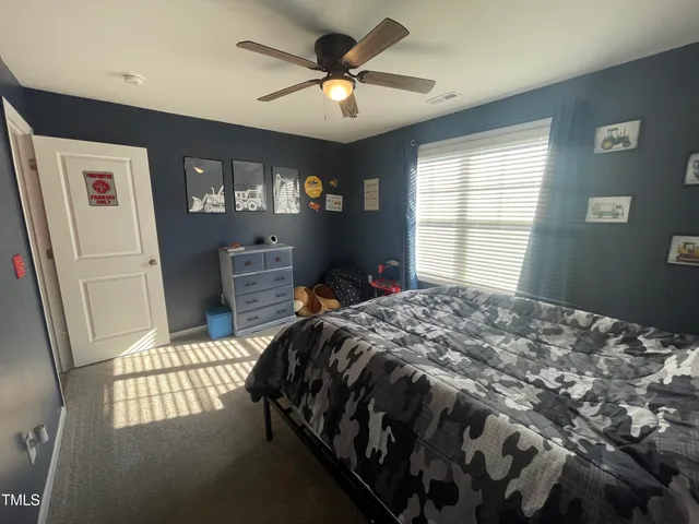 a view of a living room with furniture