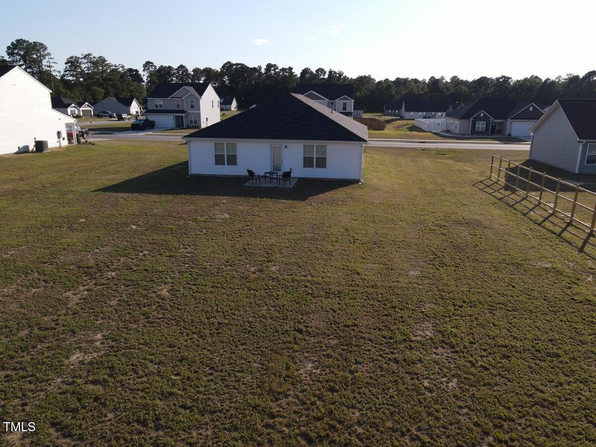 195 Presley Street Raeford, NC 28376 - Photo 7 of 37 a front view of a house with a yard