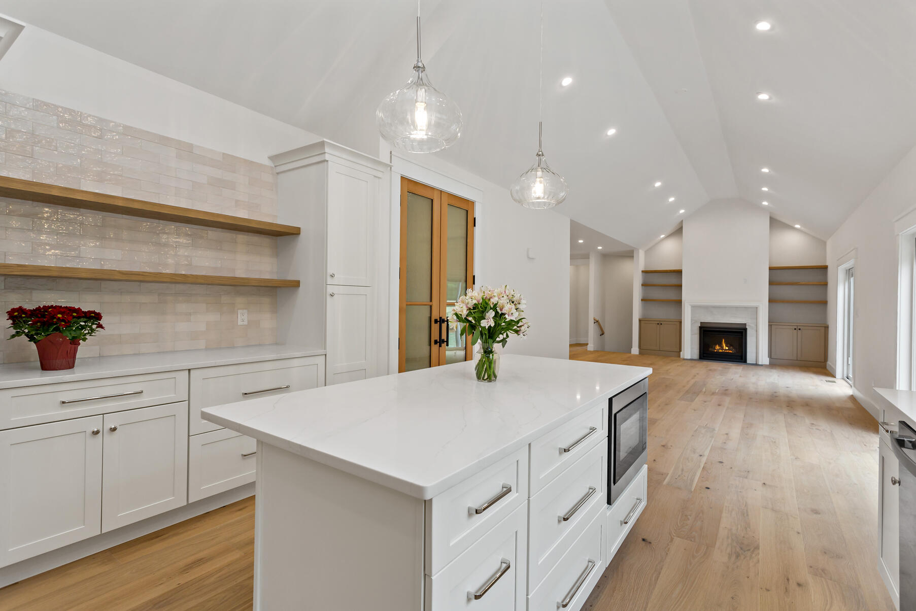 99 Orchard Road Mashpee, MA 02649 - Photo 15 of 49 a kitchen with kitchen island a sink stainless steel appliances and cabinets