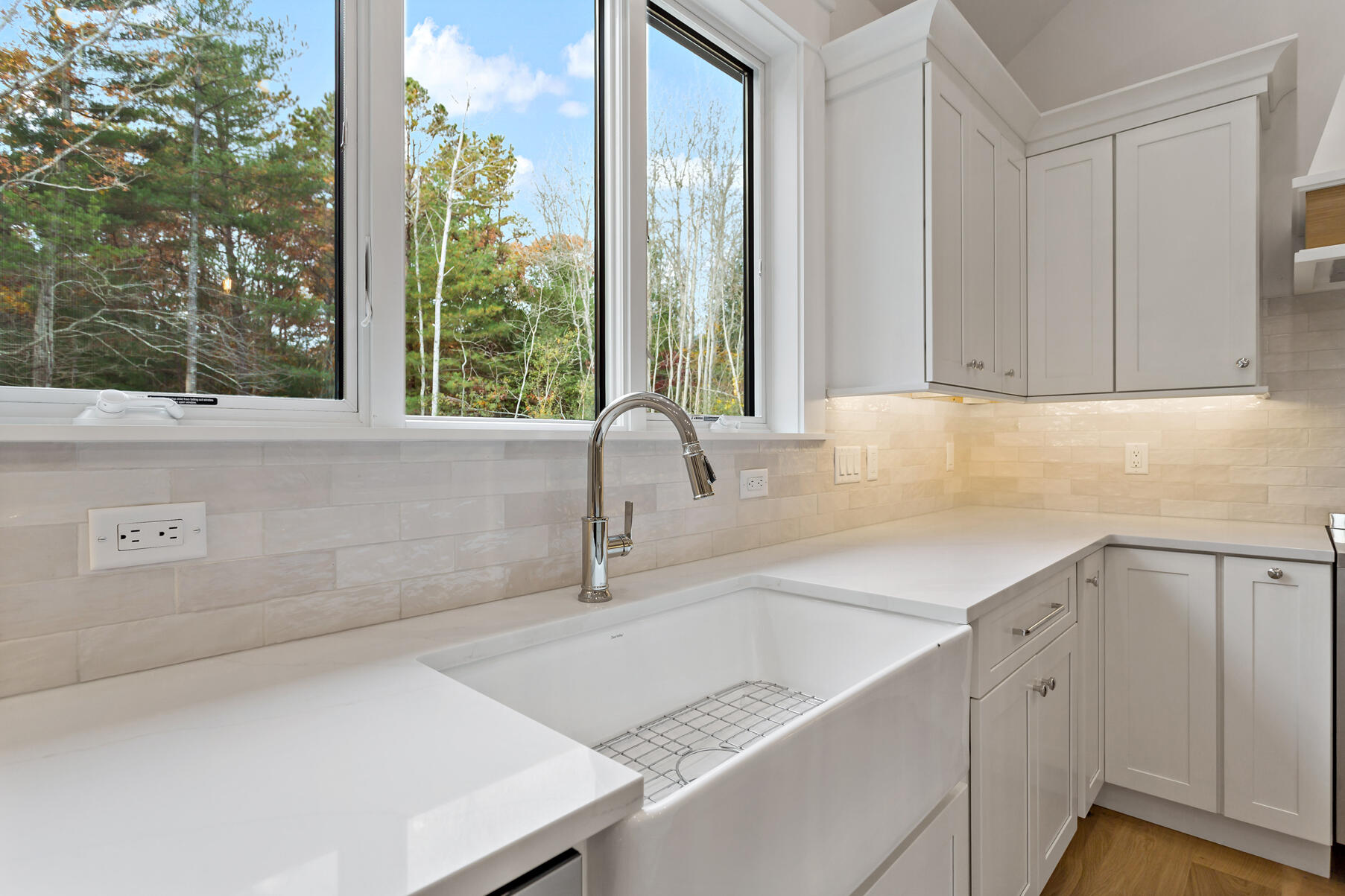 99 Orchard Road Mashpee, MA 02649 - Photo 16 of 49 a kitchen with a sink and large window