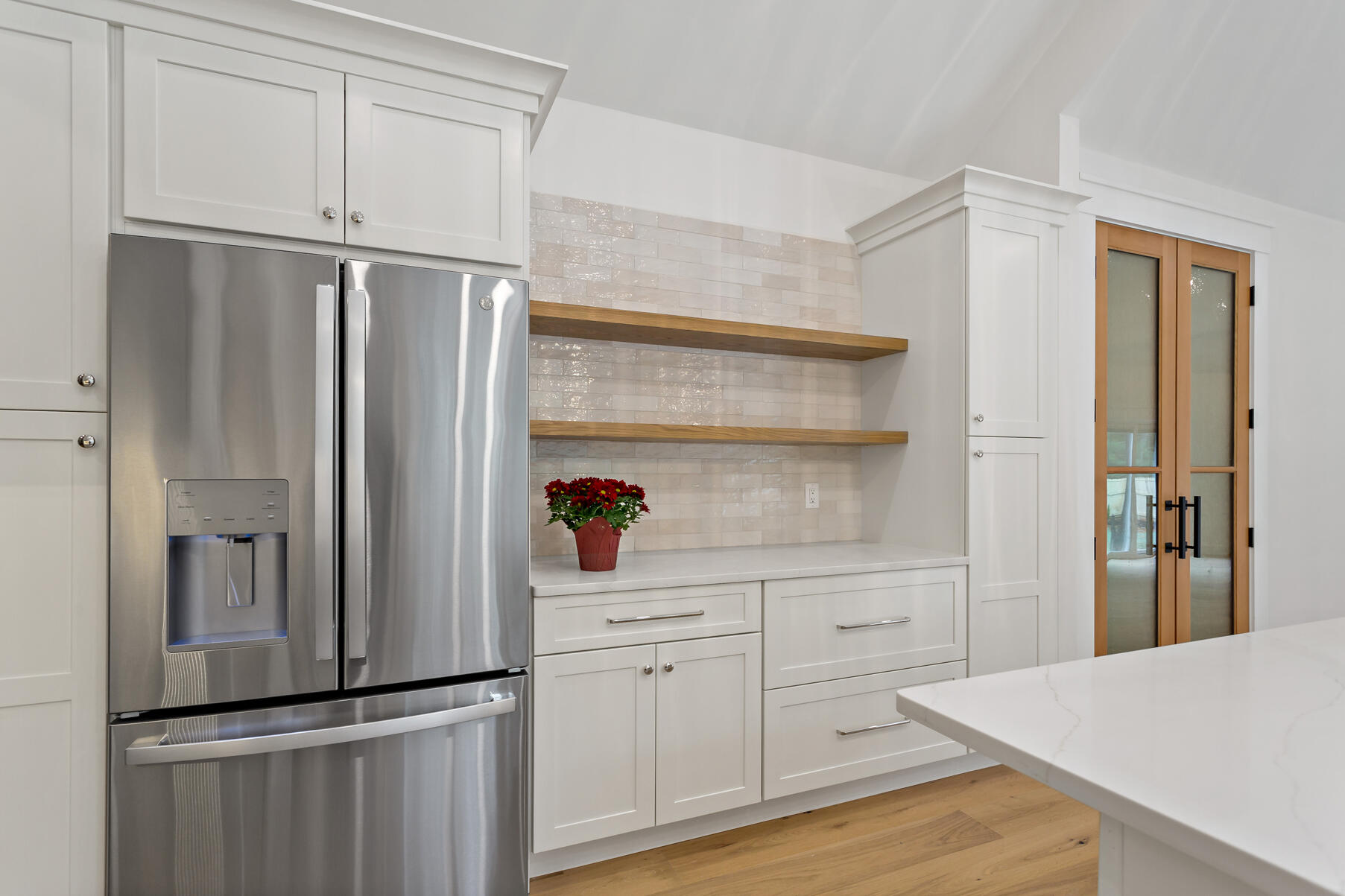 99 Orchard Road Mashpee, MA 02649 - Photo 19 of 49 a kitchen with cabinets and stainless steel appliances