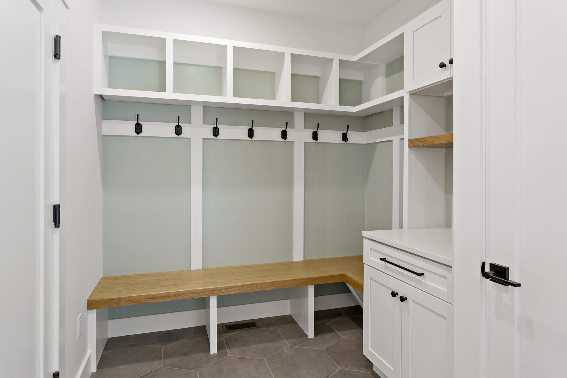 99 Orchard Road Mashpee, MA 02649 - Photo 21 of 49 a hallway with cabinets