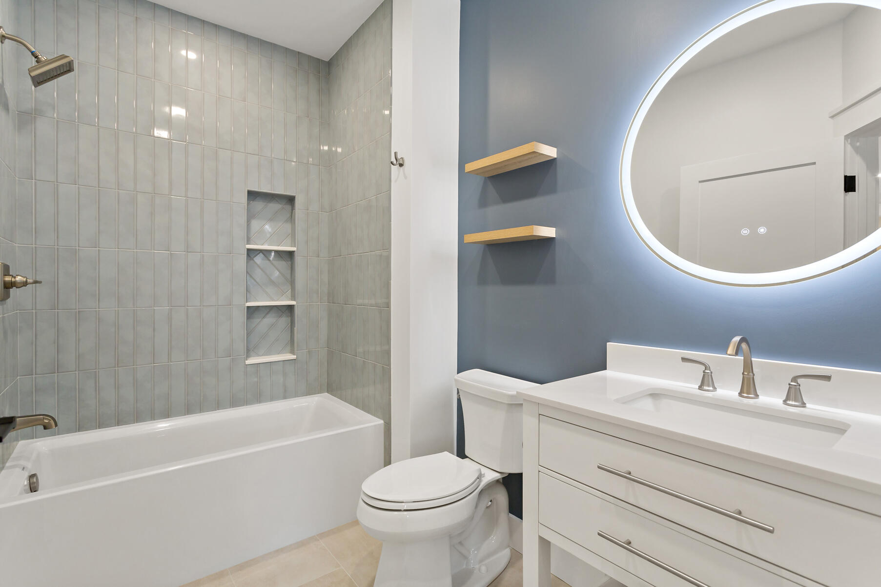 99 Orchard Road Mashpee, MA 02649 - Photo 29 of 49 a bathroom with a toilet a sink and bathtub