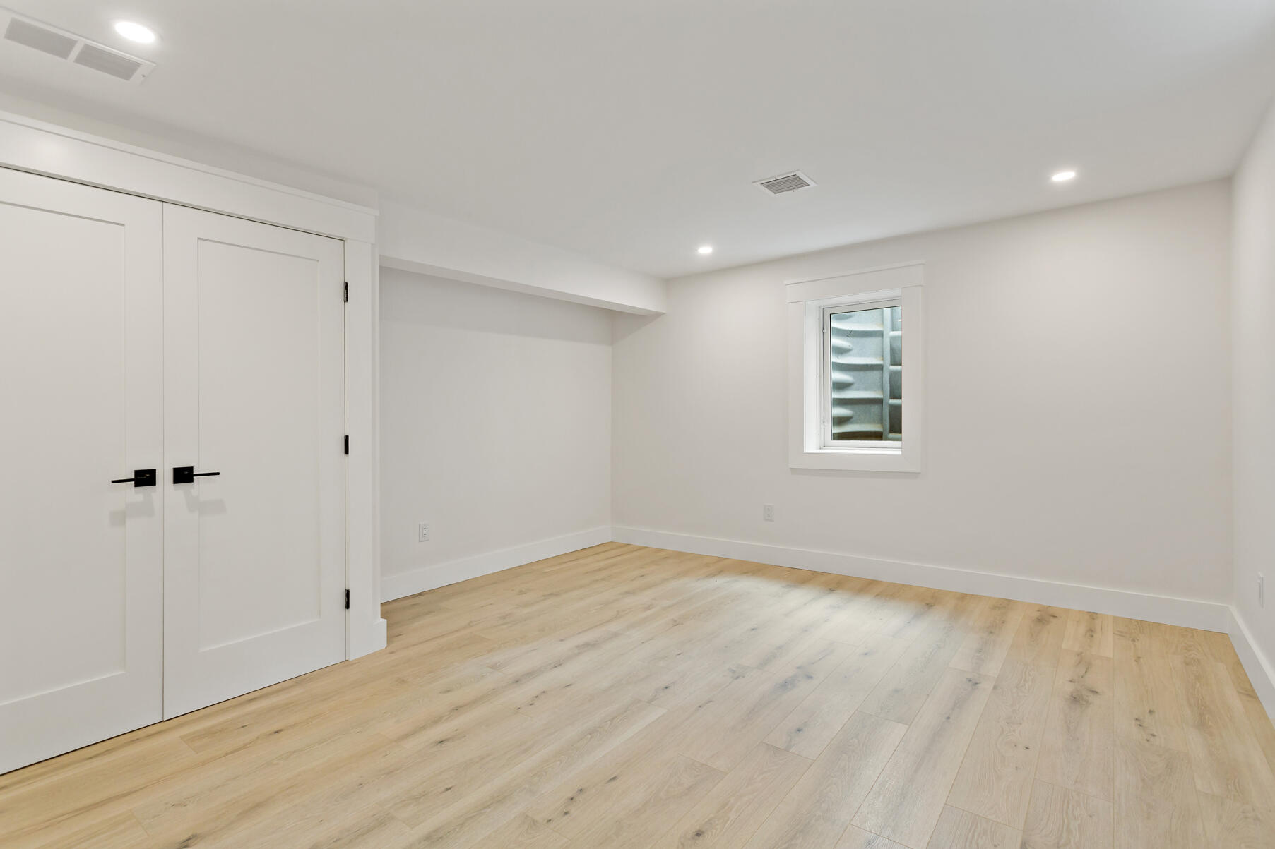 99 Orchard Road Mashpee, MA 02649 - Photo 32 of 49 wooden floor in an empty room with a window
