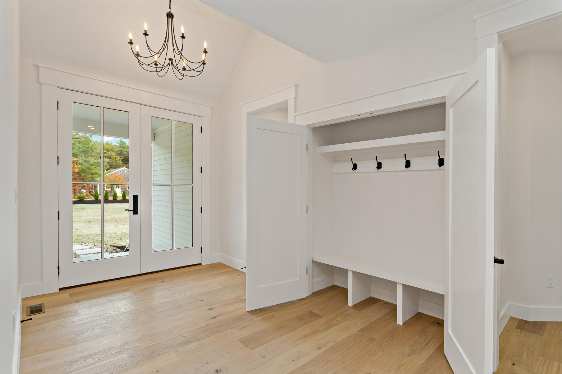 99 Orchard Road Mashpee, MA 02649 - Photo 7 of 49 a view of an empty room with a window