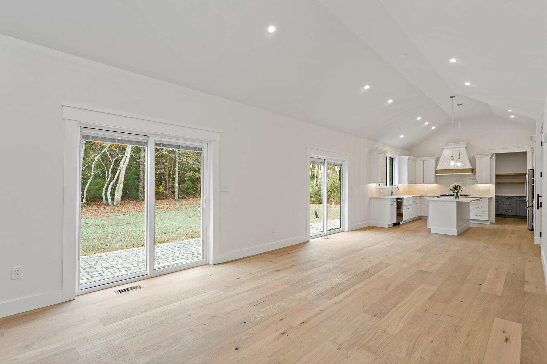 99 Orchard Road Mashpee, MA 02649 - Photo 10 of 49 a view of a kitchen with a sink and a window