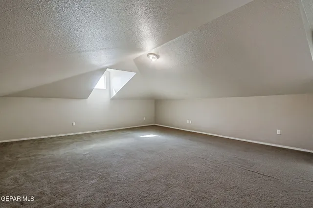 a bathroom with a sink a toilet and bathtub