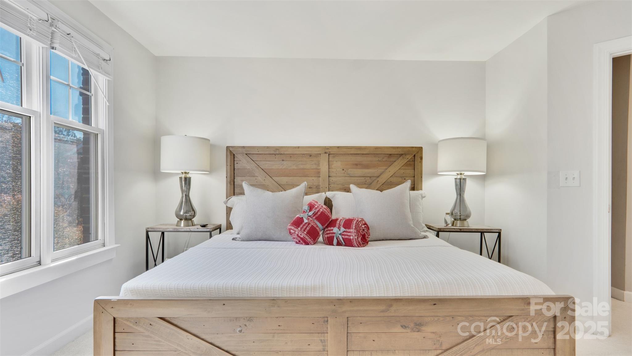 3309 Stettler View Road Charlotte, NC 28210 - Photo 12 of 29 a bedroom with a bed and window