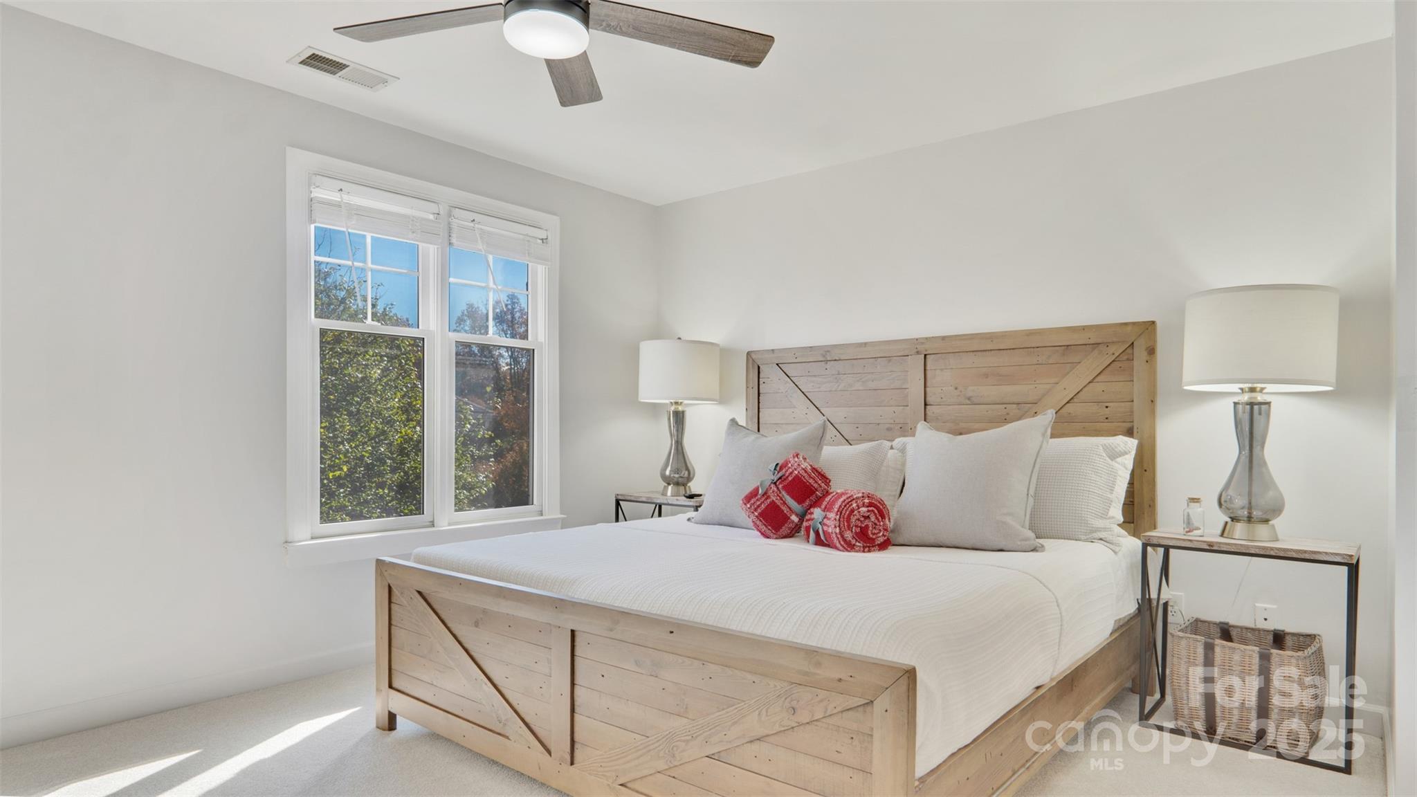 3309 Stettler View Road Charlotte, NC 28210 - Photo 14 of 29 a bedroom with a bed and a window