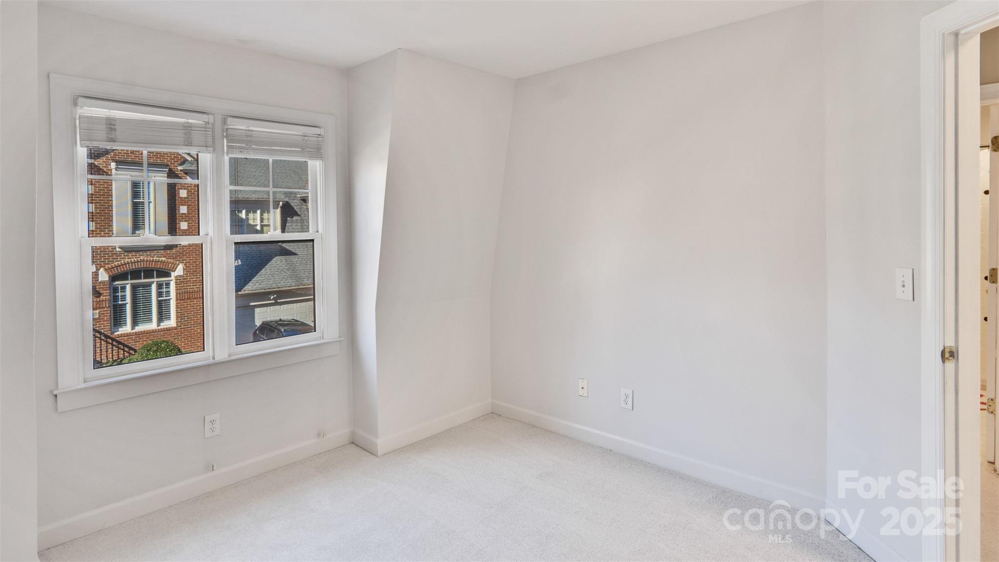 3309 Stettler View Road Charlotte, NC 28210 - Photo 19 of 29 a view of an empty room with a window