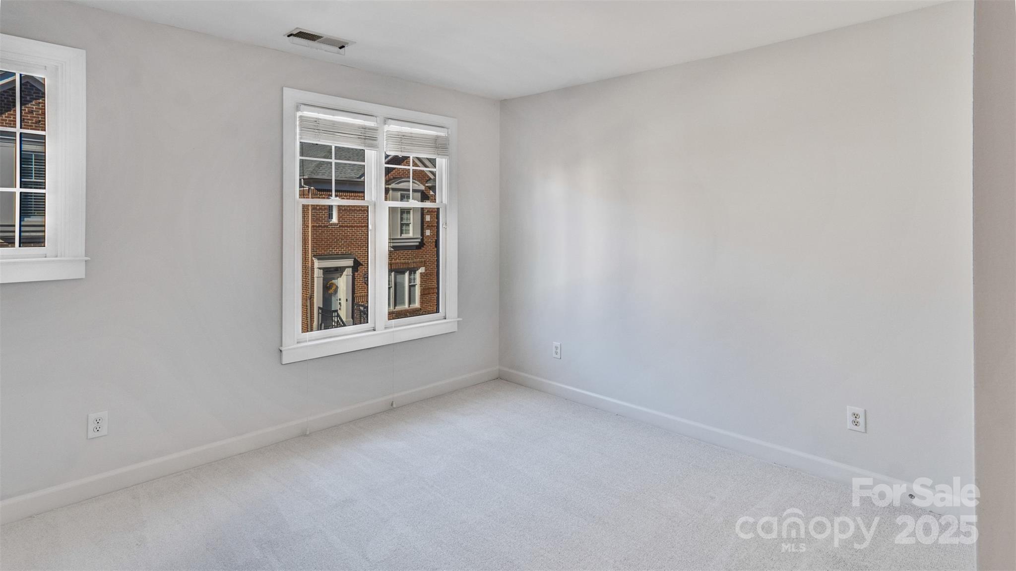 3309 Stettler View Road Charlotte, NC 28210 - Photo 23 of 29 a view of an empty room with a window