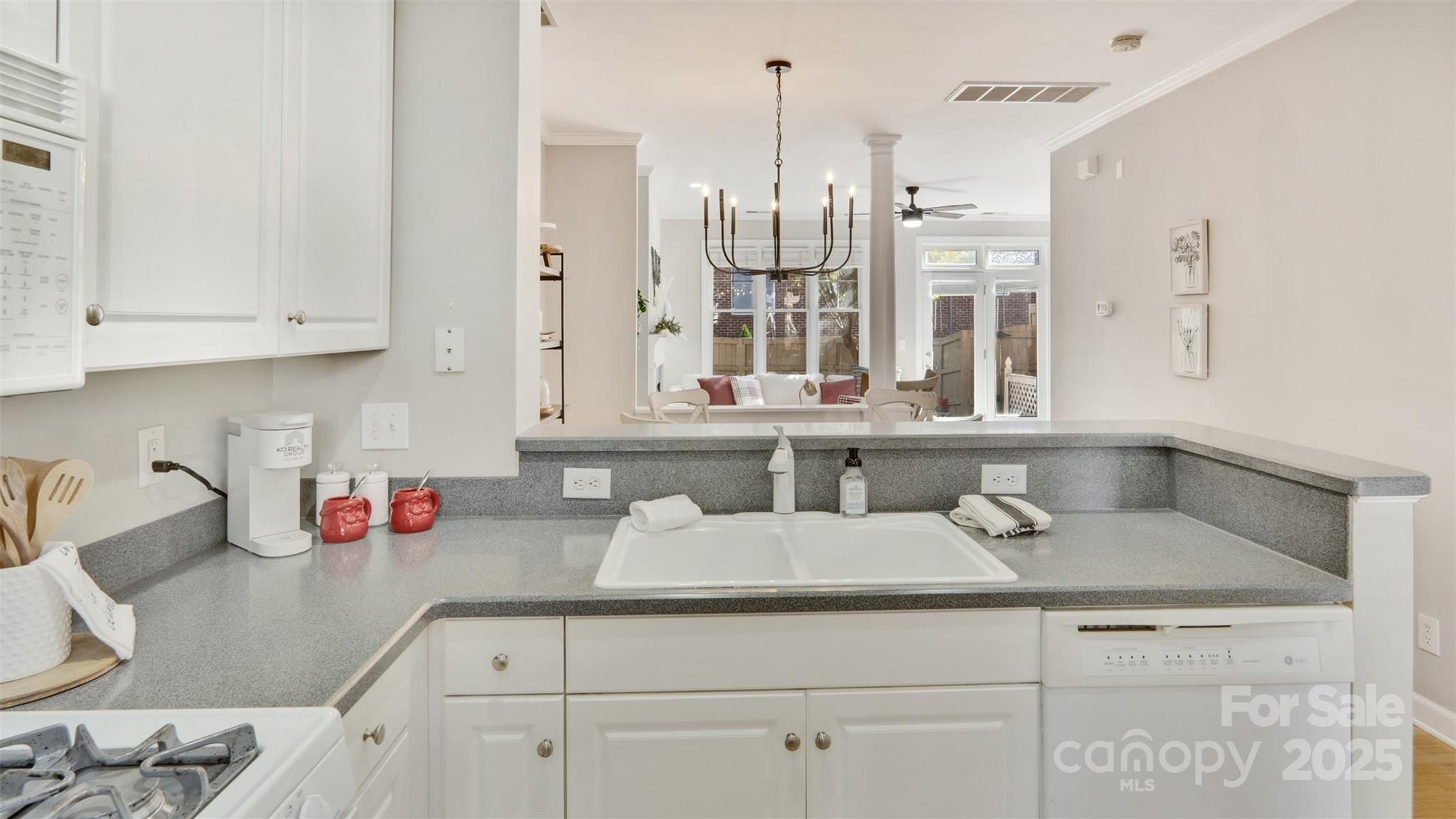 3309 Stettler View Road Charlotte, NC 28210 - Photo 5 of 29 a kitchen with cabinets appliances and a sink