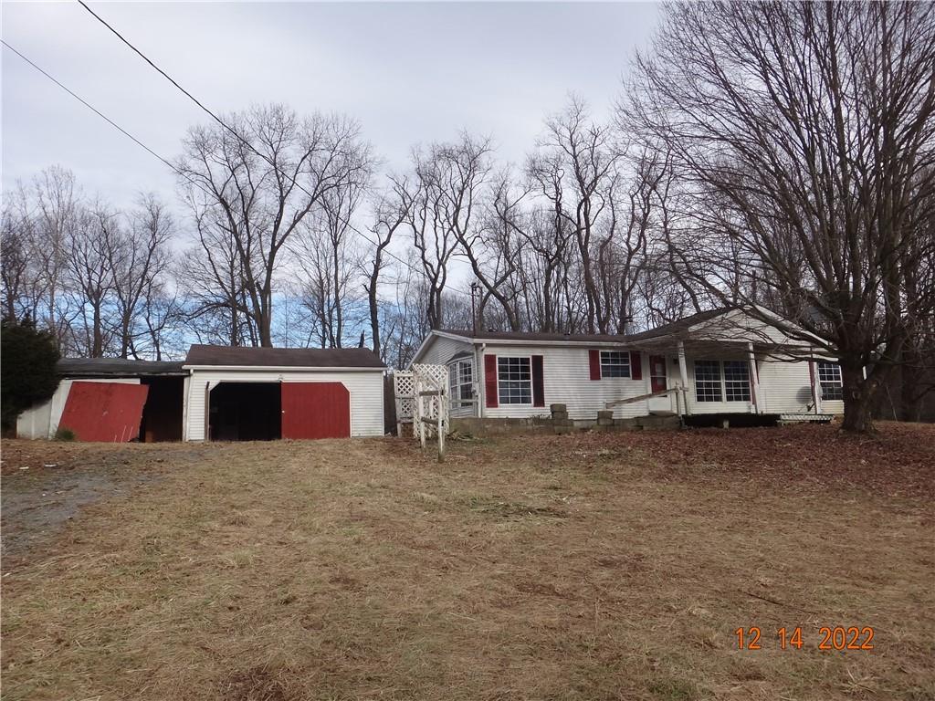 471 Millburn Road Mercer, PA 16137 - Photo 1 of 24 a view of a house with a yard