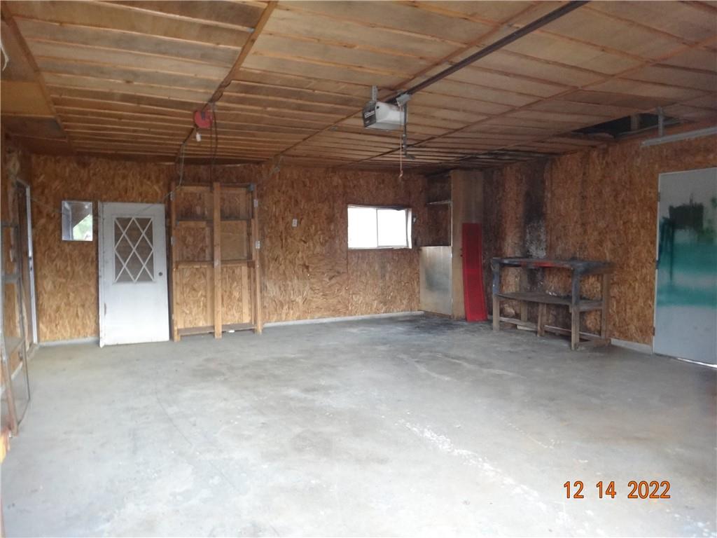 471 Millburn Road Mercer, PA 16137 - Photo 13 of 24 a view of a room with furniture and a kitchen