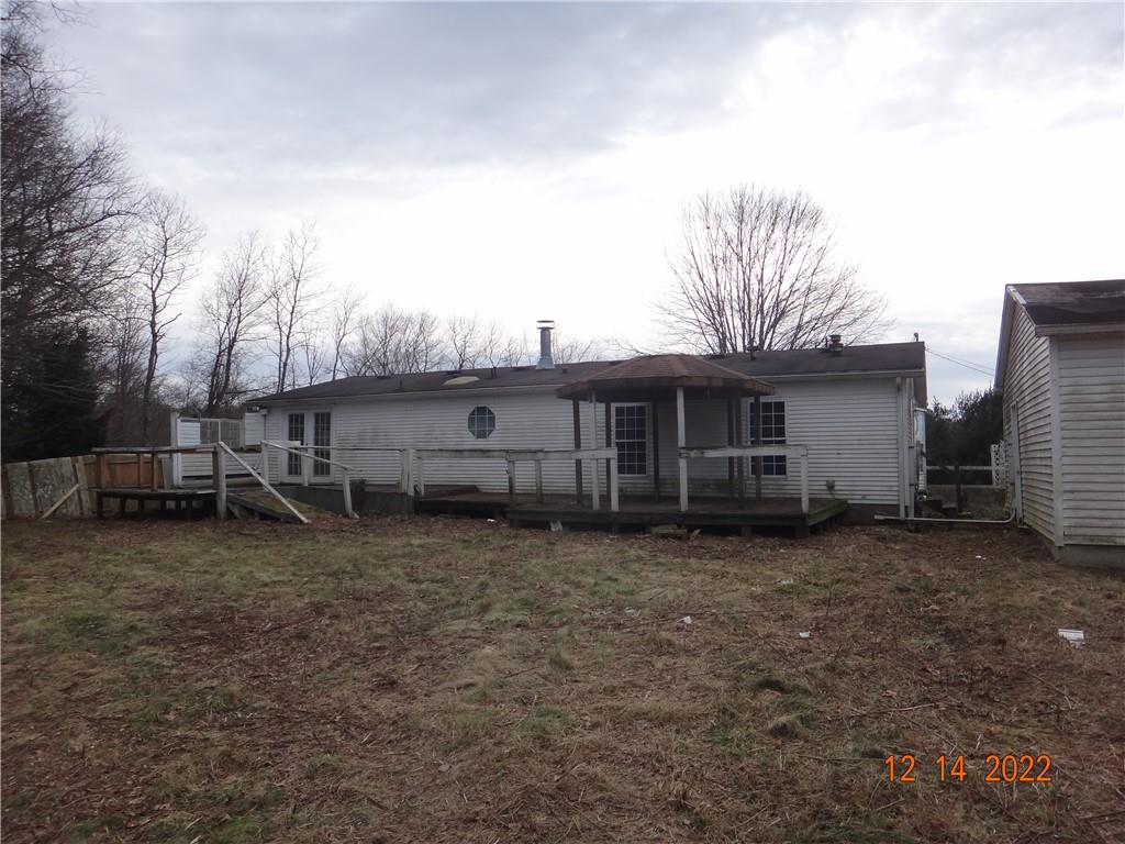 471 Millburn Road Mercer, PA 16137 - Photo 20 of 24 a view of a house with a backyard