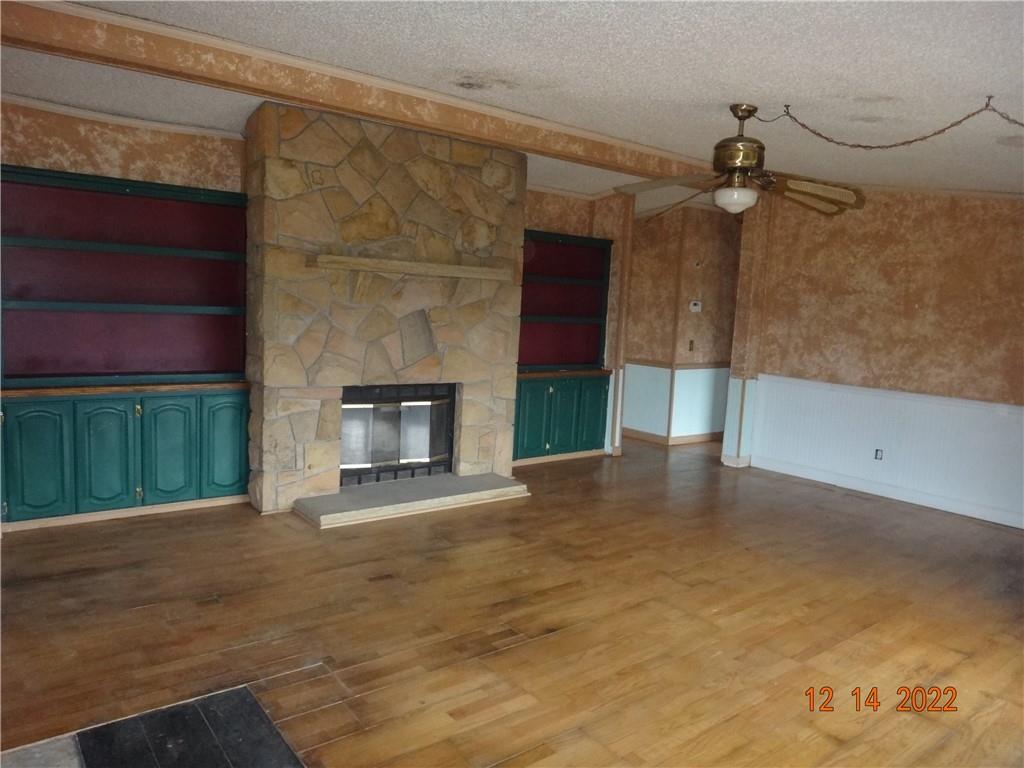 471 Millburn Road Mercer, PA 16137 - Photo 2 of 24 a view of empty room with a fireplace