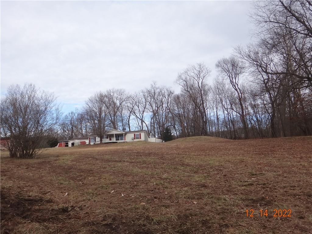 471 Millburn Road Mercer, PA 16137 - Photo 24 of 24 a backyard of a house with trees