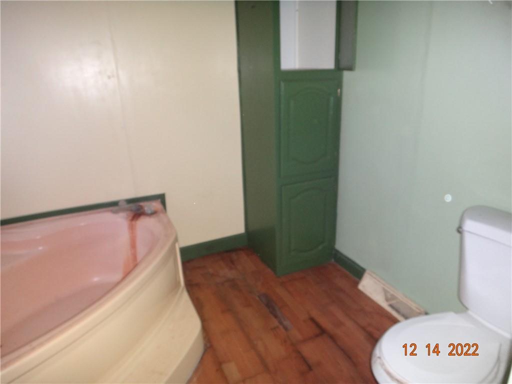 471 Millburn Road Mercer, PA 16137 - Photo 9 of 24 a bathroom with a toilet and a sink