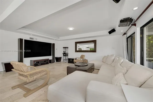 a view of a dining room with furniture water view and mountain view