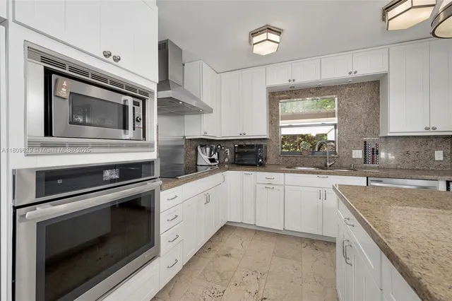 a view of entryway with a front door