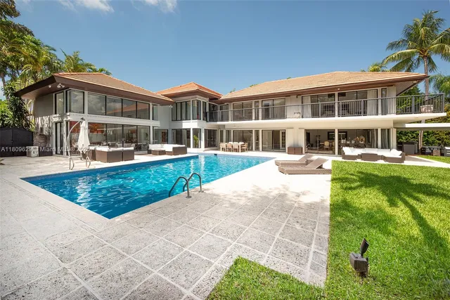 a view of balcony with wooden floor