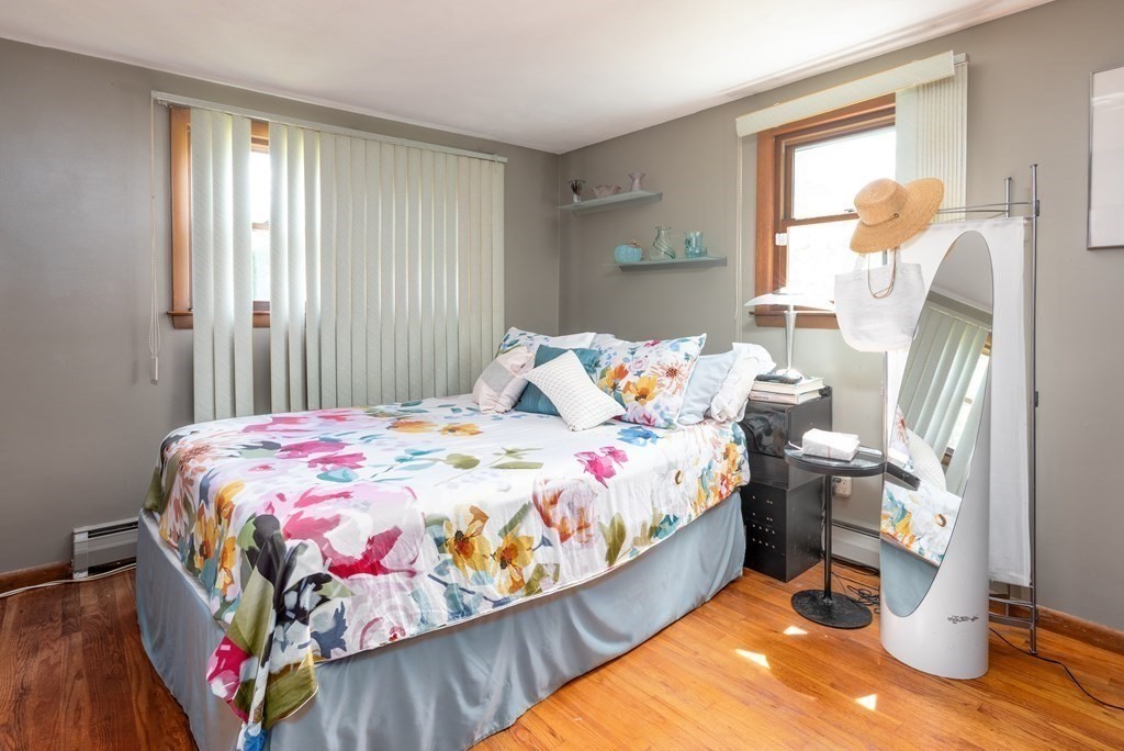 126 Baldwin Road Billerica, MA 01821 - Photo 13 of 30 a bedroom with a bed and a window