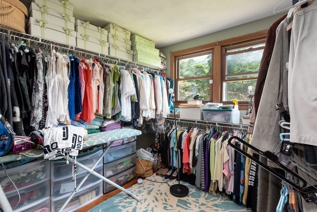 126 Baldwin Road Billerica, MA 01821 - Photo 14 of 30 a view of walk in closet with clothes