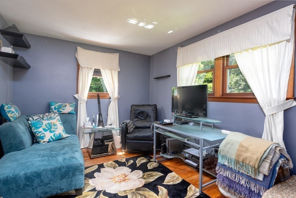126 Baldwin Road Billerica, MA 01821 - Photo 15 of 30 a work room with furniture and a window