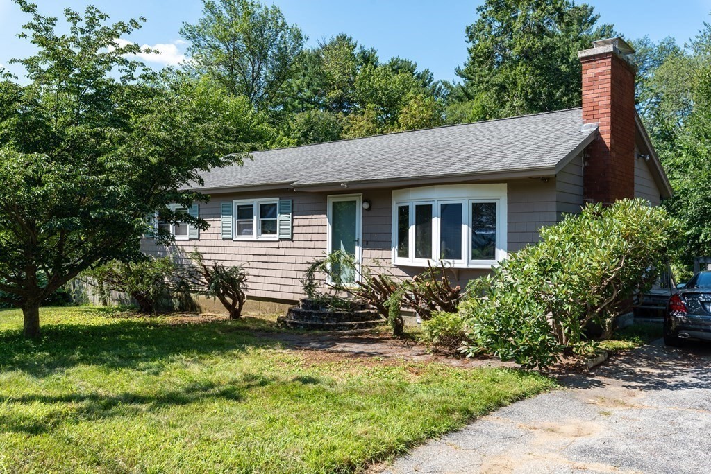 126 Baldwin Road Billerica, MA 01821 - Photo 2 of 30 a front view of a house with a yard