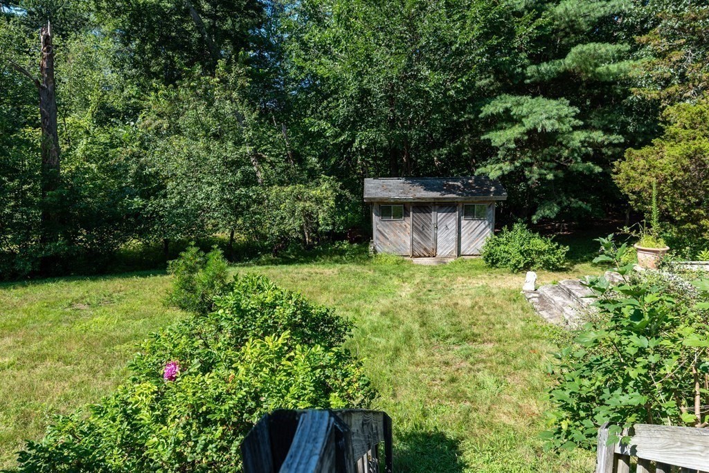 126 Baldwin Road Billerica, MA 01821 - Photo 21 of 30 a view of a house with a yard
