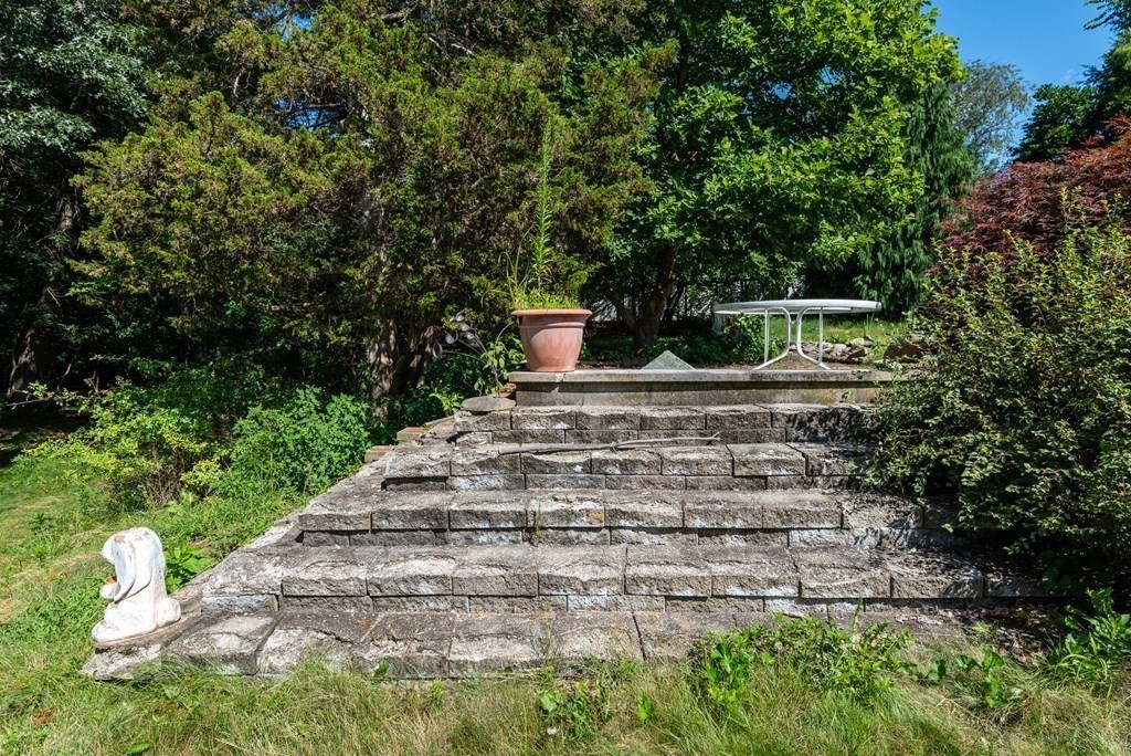 126 Baldwin Road Billerica, MA 01821 - Photo 24 of 30 a view of a yard with plants